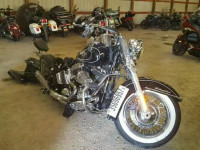 2011 HARLEY-DAVIDSON FLSTC 1HD1BW511BB047045