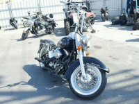 2011 HARLEY-DAVIDSON FLSTC 1HD1BW514BB044690