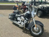 2011 HARLEY-DAVIDSON FLSTC 1HD1BW519BB034690