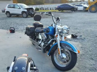 2011 HARLEY-DAVIDSON FLSTC 1HD1BW516BB026384