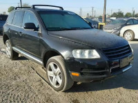 2004 VOLKSWAGEN TOUAREG 4. WVGCM67L14D019039