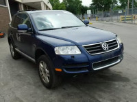 2004 VOLKSWAGEN TOUAREG 4. WVGCM77LX4D057519