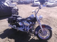 2011 HARLEY-DAVIDSON FLSTC 1HD1BW51XBB024587