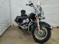 2011 HARLEY-DAVIDSON FLSTC 1HD1BW511BB015874