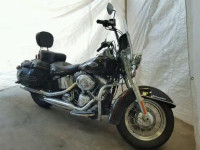 2011 HARLEY-DAVIDSON FLSTC 1HD1BW519BB037766