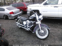2011 HARLEY-DAVIDSON FLSTN 1HD1JD515BB024620