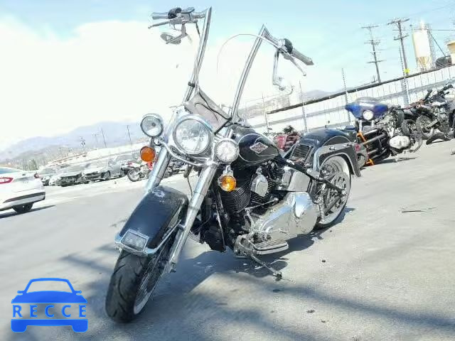 2011 HARLEY-DAVIDSON FLSTC 1HD1BW514BB044690 image 1