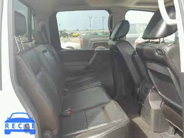 2011 NISSAN TITAN 1N6BA0ED7BN307072 image 4