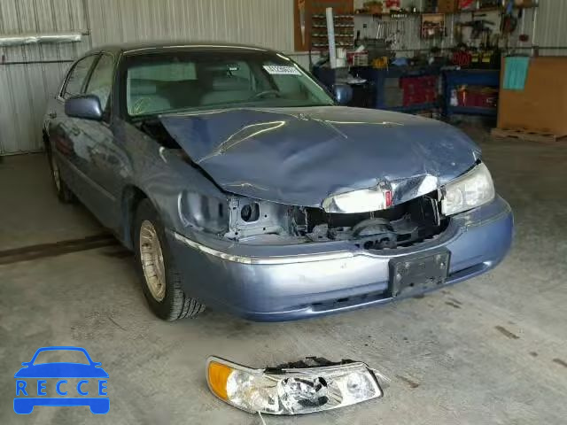 1999 LINCOLN TOWN CAR 1LNHM81W3XY660999 image 0