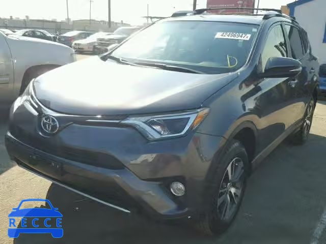 2016 TOYOTA RAV4 JTMWFREV8GJ087863 Bild 1