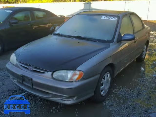 2001 KIA SEPHIA KNAFB121X15048297 Bild 1