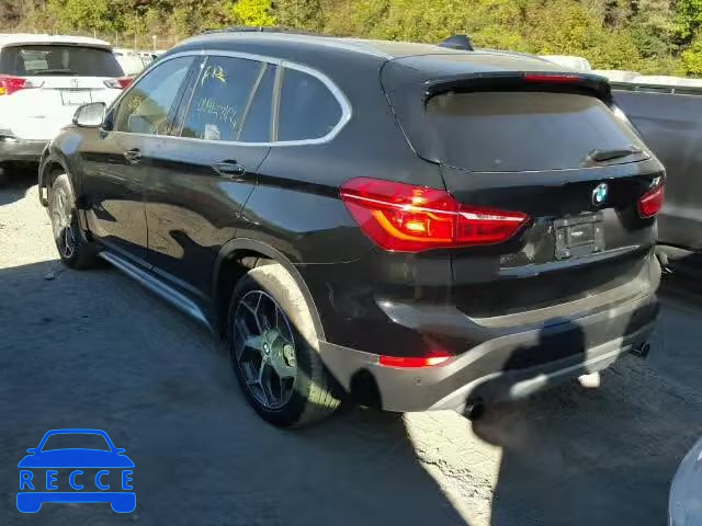 2017 BMW X1 WBXHT3C34H5F69813 Bild 2