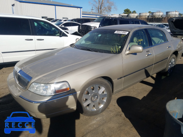 2004 LINCOLN TOWNCAR 1LNHM81W94Y657181 image 1