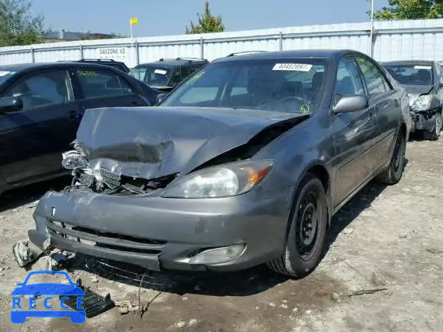 2003 TOYOTA CAMRY LE JTDBE32K630144697 image 1