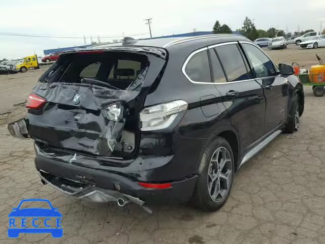 2017 BMW X1 WBXHT3Z37H4A57136 Bild 3