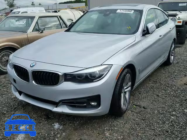 2018 BMW 330 XIGT WBA8Z9C54JG828515 image 1