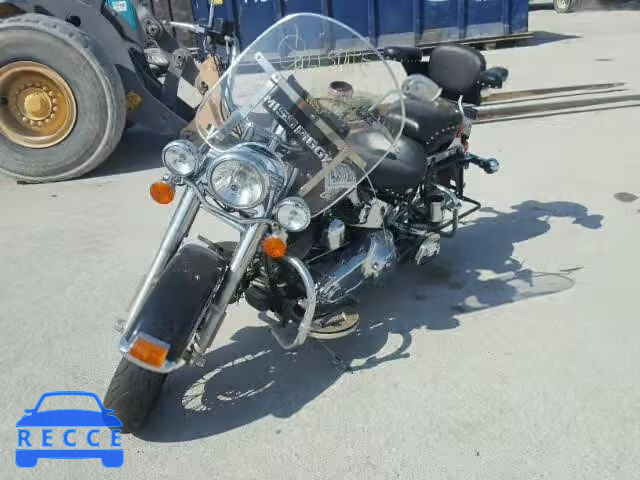 2011 HARLEY-DAVIDSON FLSTC 1HD1BW516BB047476 image 1