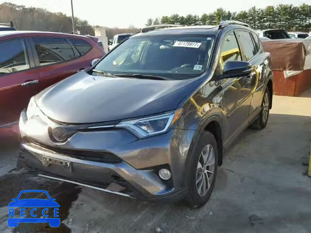 2016 TOYOTA RAV4 HV XL JTMRJREV4GD017075 image 1