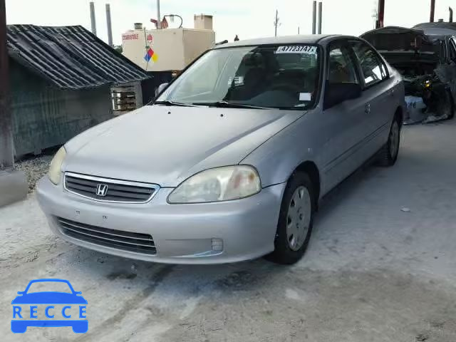 1999 HONDA CIVIC BASE 2HGEJ6615XH557869 image 1