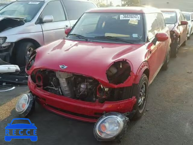 2010 MINI COOPER CLU WMWML3C54ATX38799 Bild 1