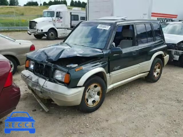 1998 SUZUKI SIDEKICK S JS3TD21V3W4107134 Bild 1