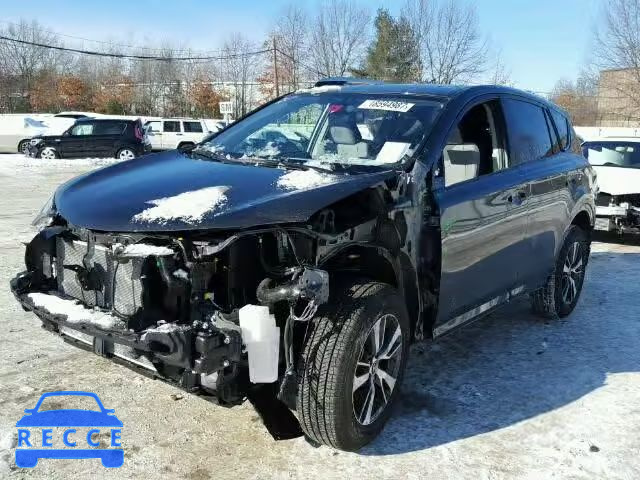 2016 TOYOTA RAV4 XLE JTMRFREV9GJ084497 image 1