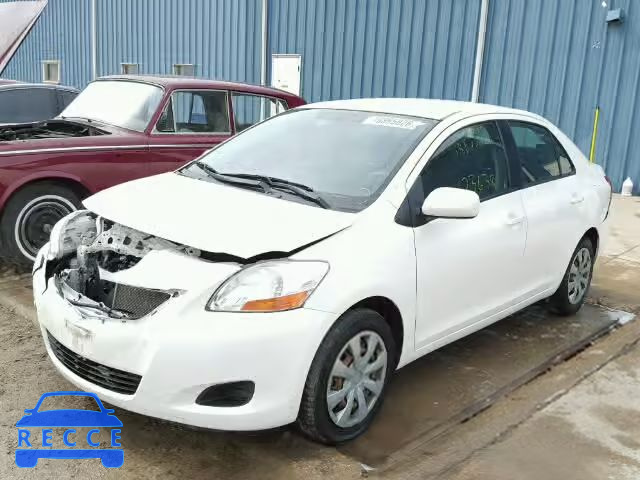 2009 TOYOTA YARIS JTDBT903691334443 image 1