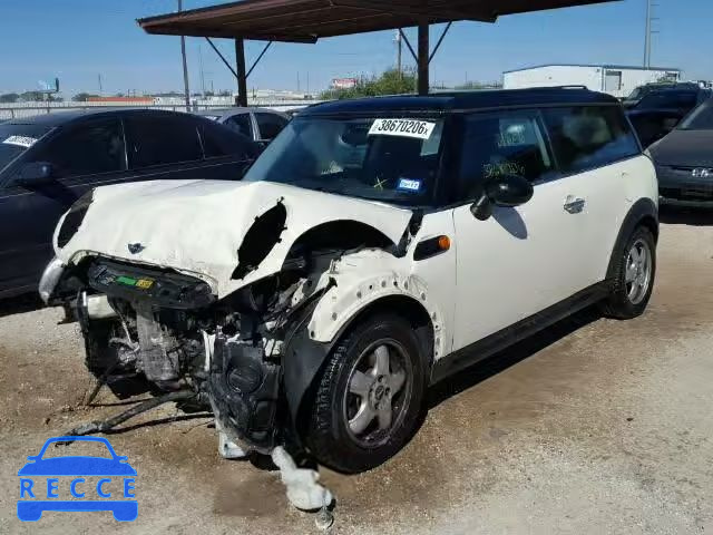 2009 MINI COOPER CLU WMWML33519TP97692 Bild 1