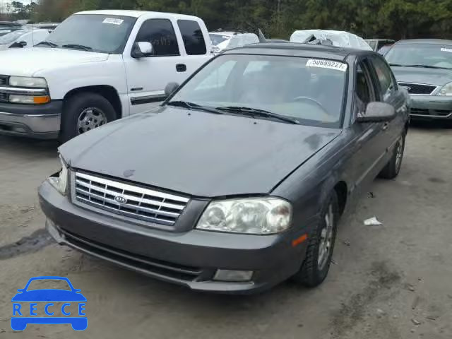 2002 KIA OPTIMA MAG KNAGD128325156676 image 1