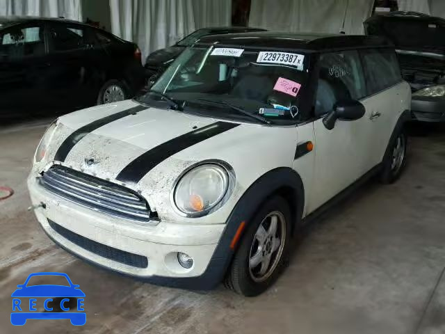 2009 MINI COOPER CLU WMWML33509TX35488 Bild 1