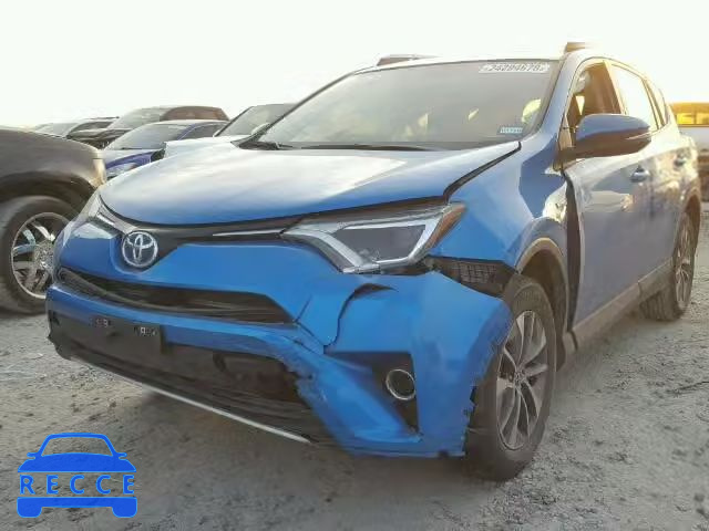 2016 TOYOTA RAV4 HV XL JTMRJREV3GD005581 image 1