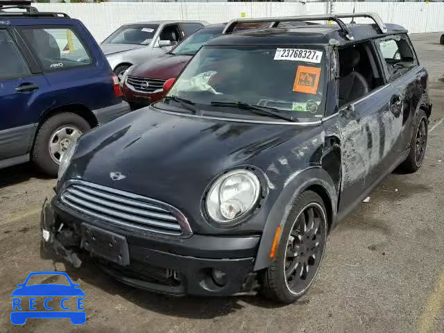 2009 MINI COOPER CLU WMWML33559TX36409 зображення 1