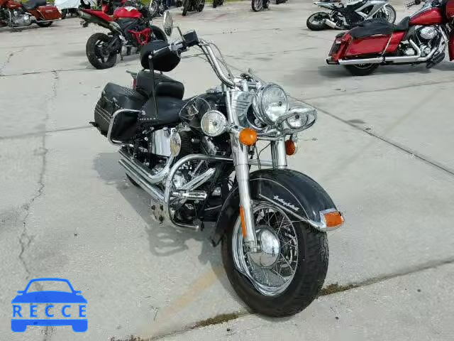 2011 HARLEY-DAVIDSON FLSTC 1HD1BW512BB032201 image 0