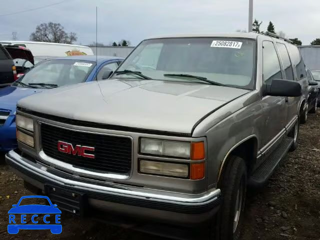 1999 GMC K1500 SUBU 1GKFK16R0XJ797889 Bild 1