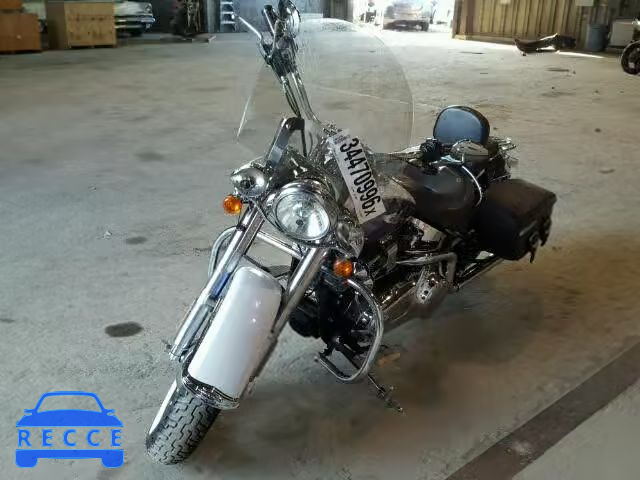 2010 HARLEY-DAVIDSON FLSTN 1HD1JD516AB015598 image 1