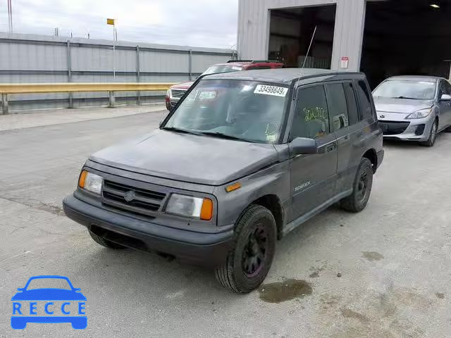 1997 SUZUKI SIDEKICK J JS3TE02V2V4100254 image 1