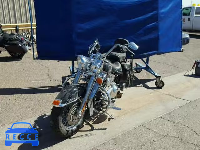 2011 HARLEY-DAVIDSON FLSTC 1HD1BW511BB025952 image 1