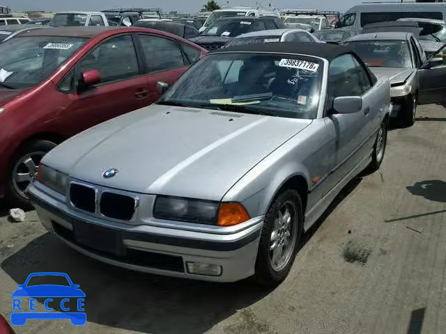 1999 BMW 323 IC WBABJ733XXEA18121 Bild 1