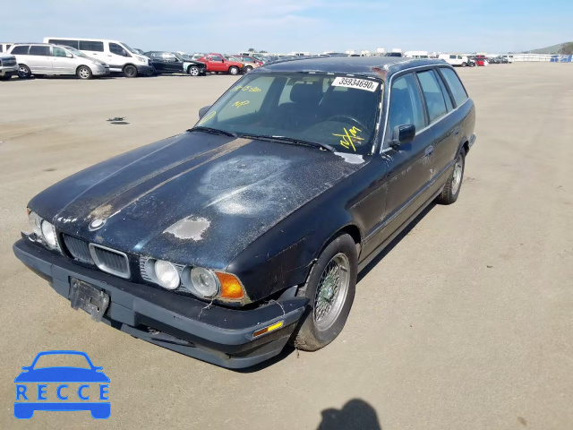 1994 BMW 530 IT WBAHK2312RGF80093 Bild 1