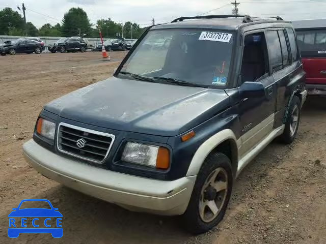 1997 SUZUKI SIDEKICK S JS3TD21V9V4104611 Bild 1