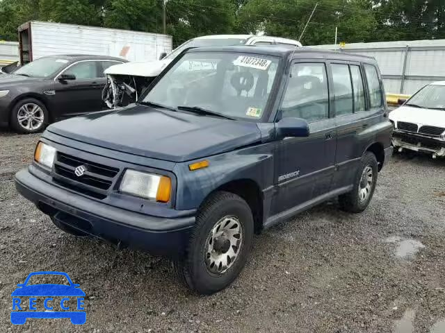 1997 SUZUKI SIDEKICK J JS3TD03V0V4100965 image 1