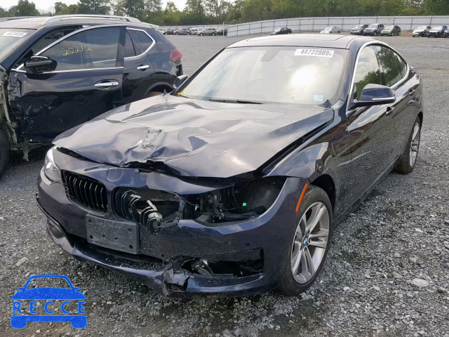 2018 BMW 330 XIGT WBA8Z9C56JG828175 image 1