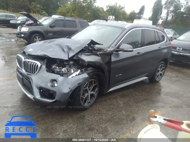 2017 BMW X1 XDRIVE28I WBXHT3C36H5F75287 image 1