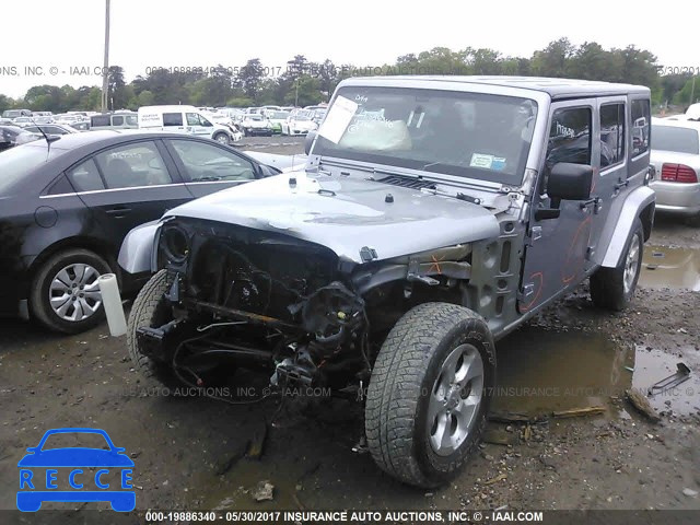 2014 Jeep Wrangler Unlimited SAHARA 1C4HJWEG0EL143237 зображення 5