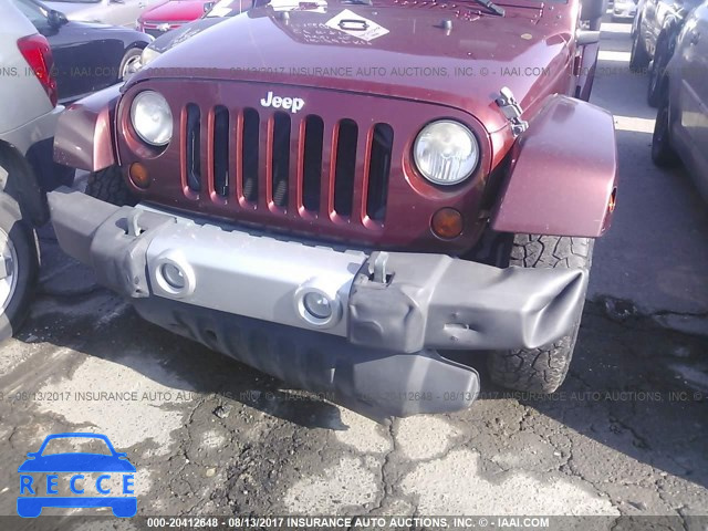 2010 Jeep Wrangler Unlimited SAHARA 1J4HB5H16AL123660 зображення 5