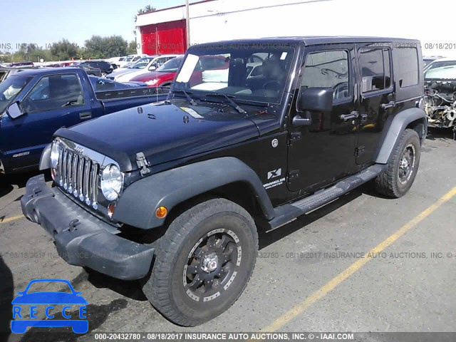 2009 Jeep Wrangler Unlimited 1J4GA39139L700898 зображення 1