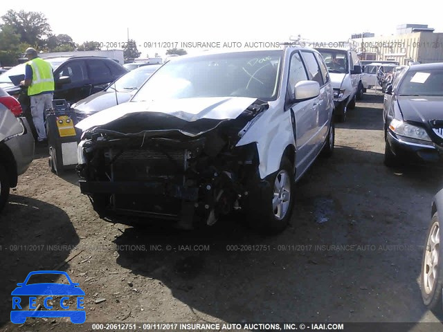 2012 Dodge Grand Caravan SXT 2C4RDGCG8CR318780 зображення 1