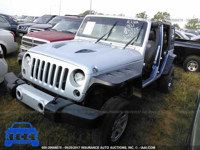 2010 Jeep Wrangler Unlimited RUBICON 1J4HA6H11AL214232 Bild 1