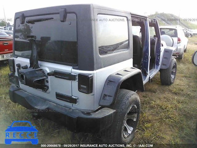 2010 Jeep Wrangler Unlimited RUBICON 1J4HA6H11AL214232 зображення 3