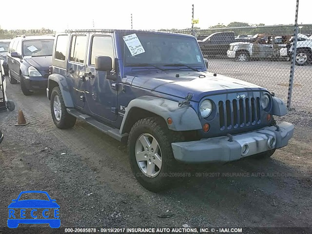 2009 Jeep Wrangler Unlimited 1J4GB39189L780308 image 0